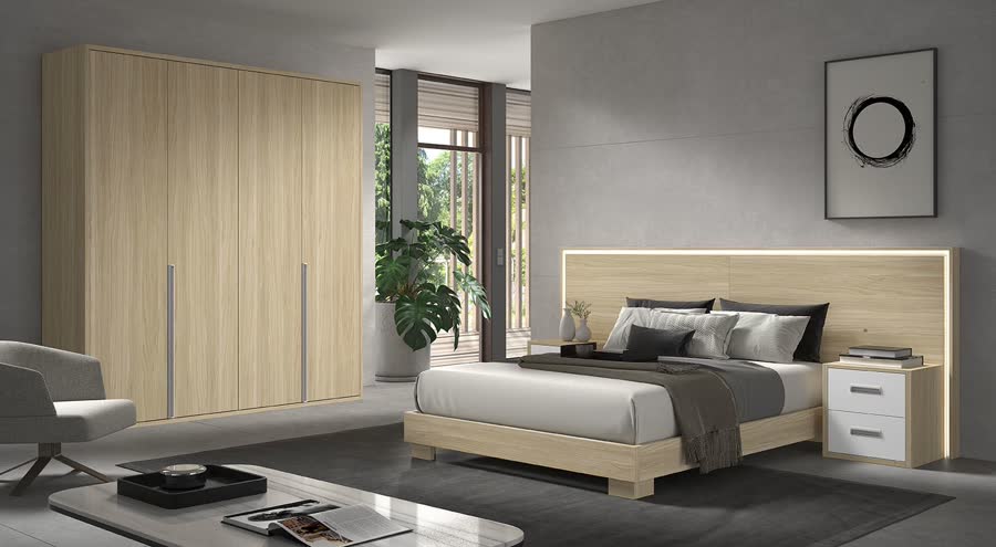 Dormitorio con cama, armario alto y mesitas de noche en madera clara y blanco